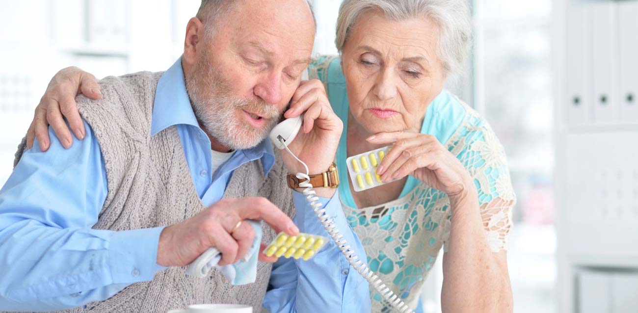 Senior couple discussing their Medicare coverage for 2022.